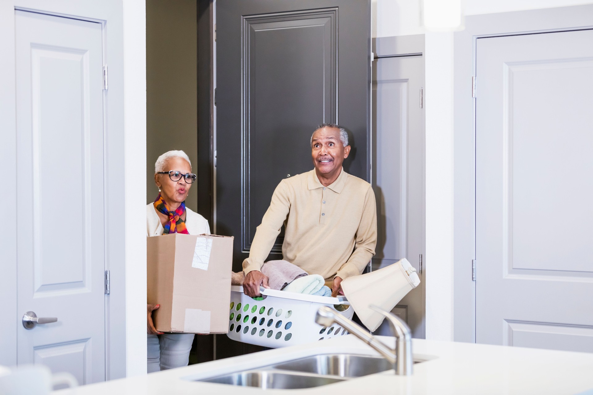 Senior African-American couple moving house